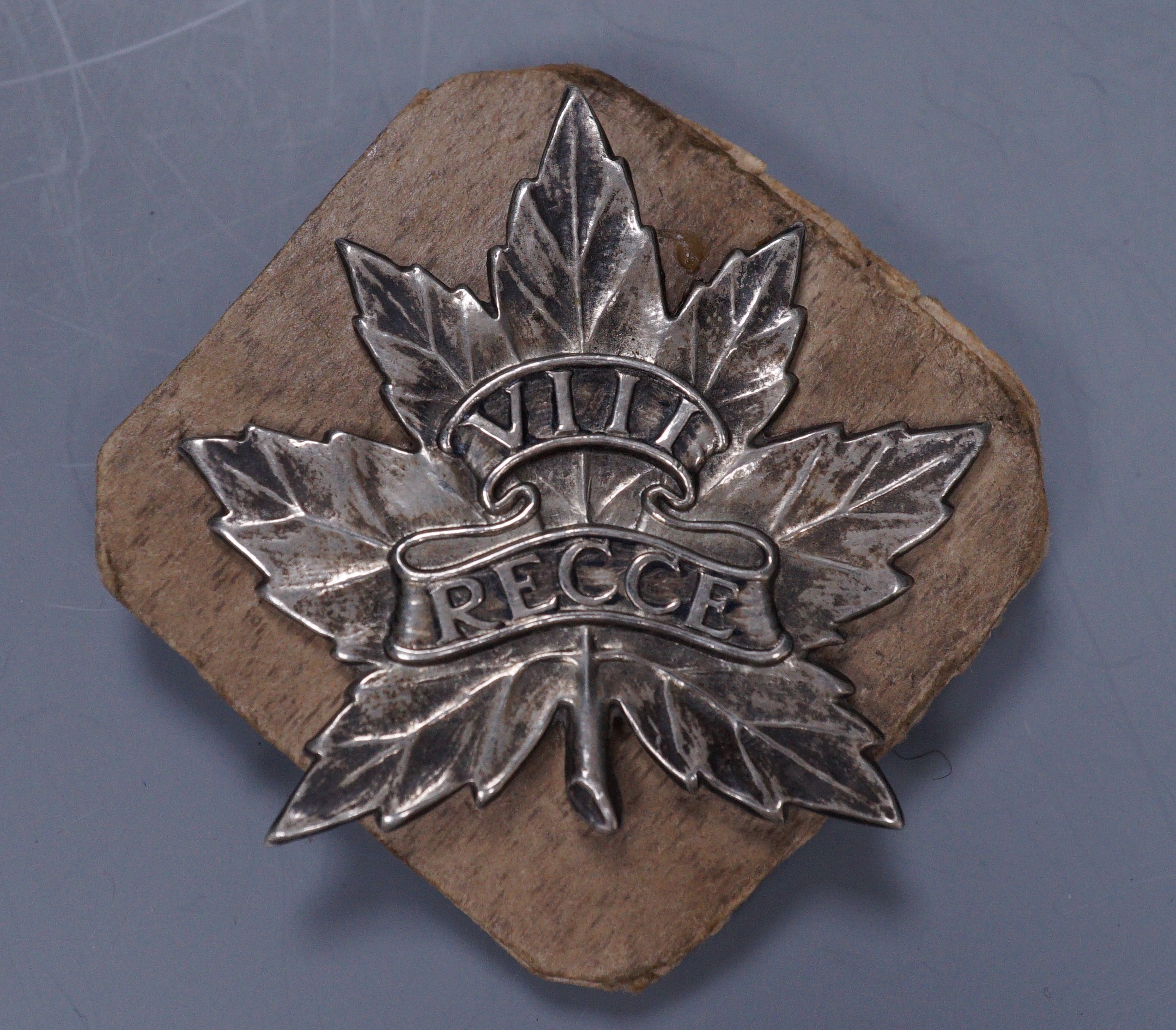 A rare WWII Canadian 8th Reconnaissance cap badge, made in 1942